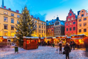 Beautiful snowy winter scenery of Christmas holiday fair at the Big Square (Stortorget) in the Old Town (Gamla Stan) in Stockholm, Sweden